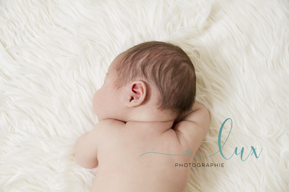 Montreal baby photography. Baby sleeping on stomach.