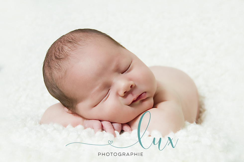 Montreal baby photography. Baby boy sleeping on his stomach.