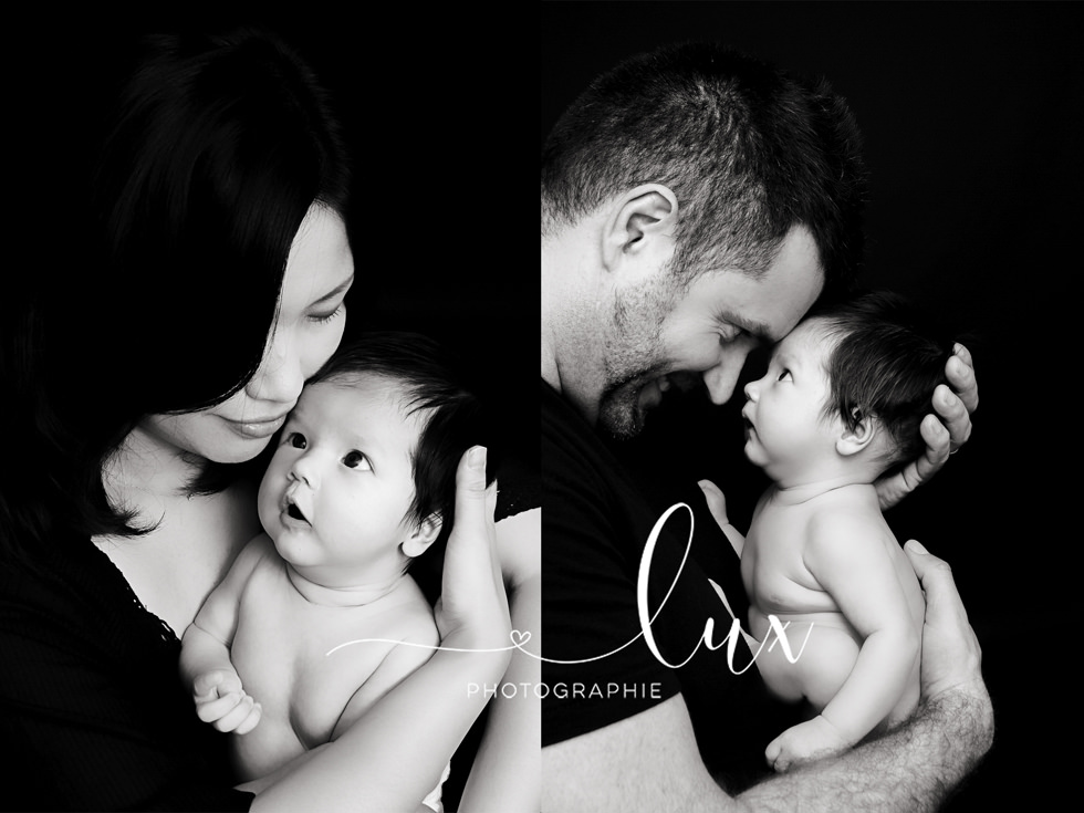 Laval Newborn Photography. Mom and dad posing with newborn baby.