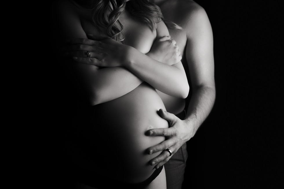Montreal Maternity Photography. Man holding pregnant woman