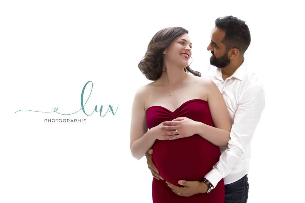 Pregnancy Photography Montreal. Pregnant woman and man holding belly.