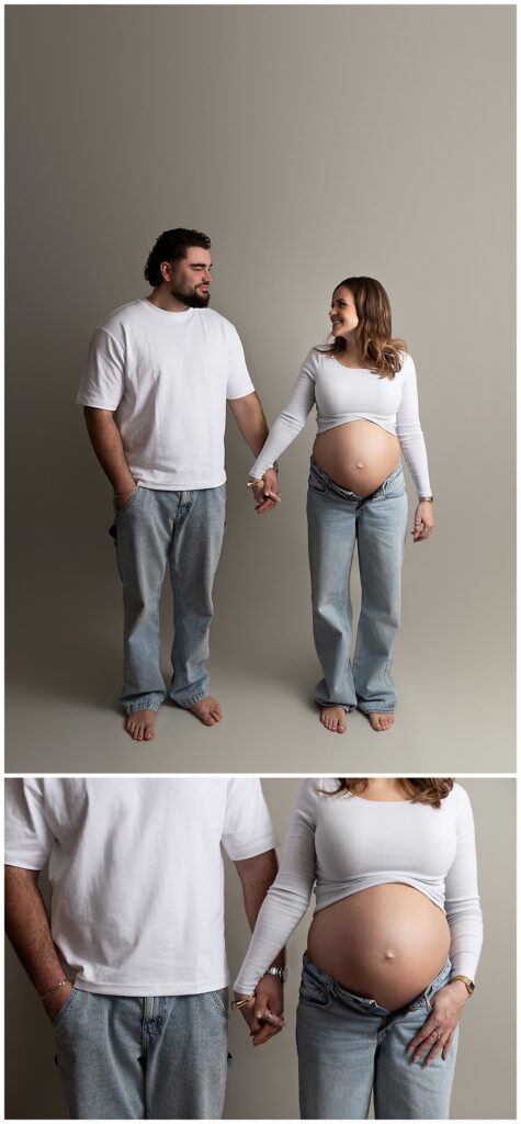 Couple in relaxed, natural poses holding hands.